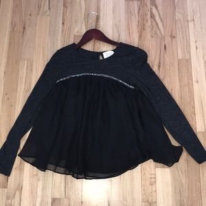 A long sleeve dress shirt.